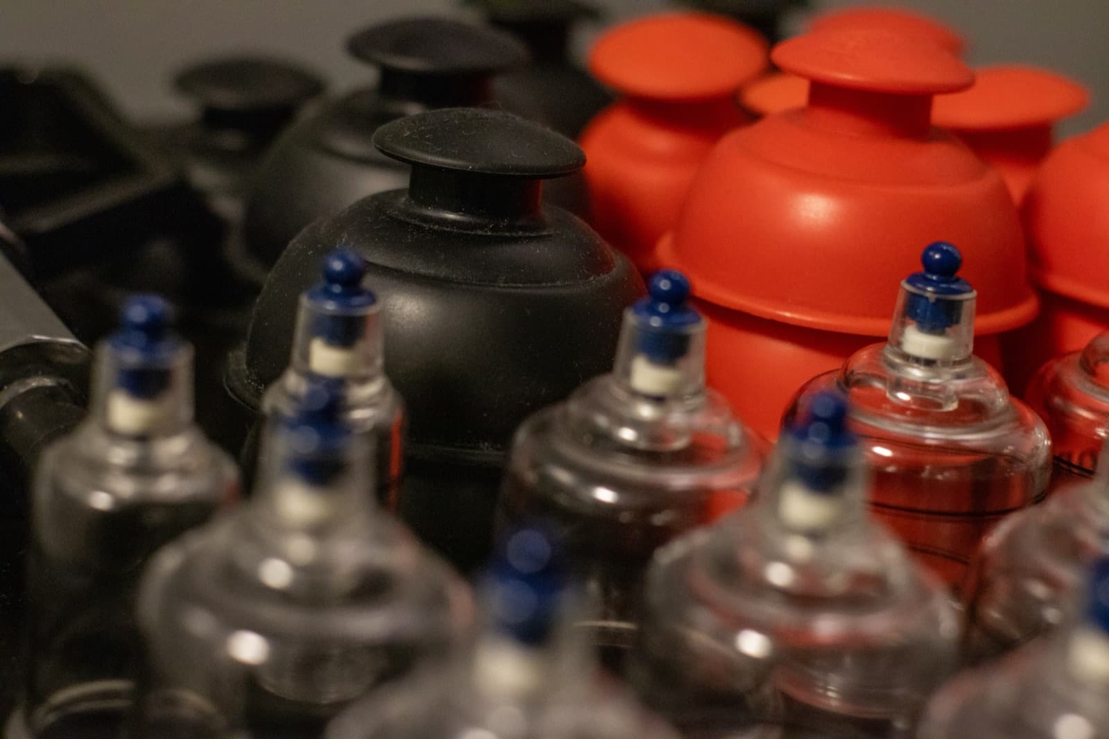 Cupping therapy being applied to an athlete's back at QiroFit in Los Angeles.