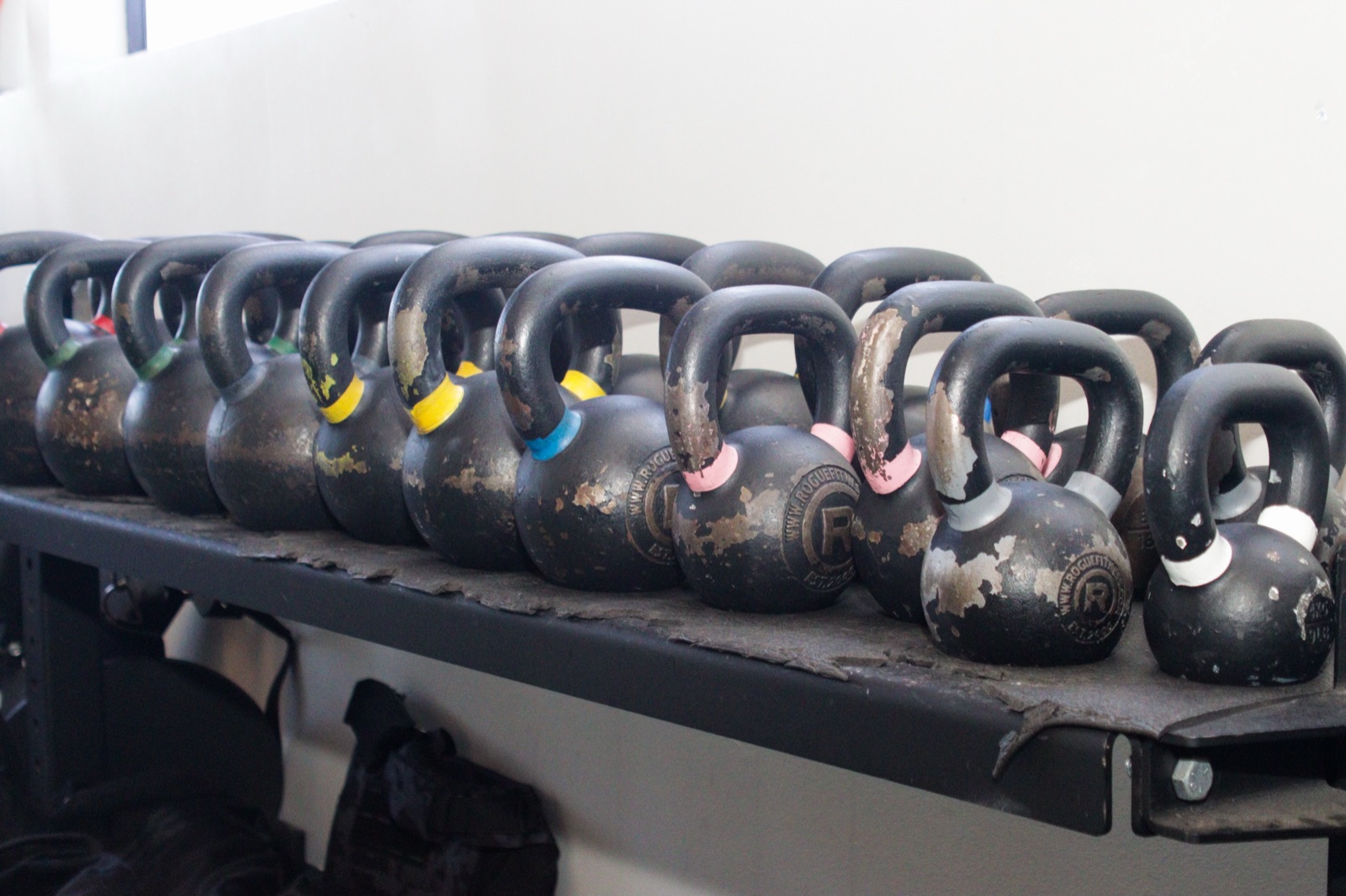 A rack of kettlebells used for clinical strength and conditioning